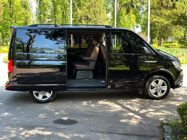 Volkswagen Multivan черный прокат аренда микроавтобус на свадьбу трансфер